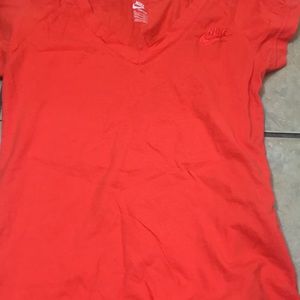 orange nike shirt